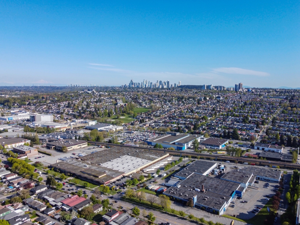 Renfrew-Collingwood, Vancouver Aerial view over blocks of single-family houses, a rail corridor and low-rise commercial buildings in Renfrew Heights, Renfrew-Collingwood, Vancouver